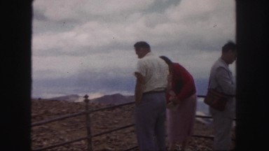 1958: people on a lookout platform overlooking a rugged landscape COLORADO