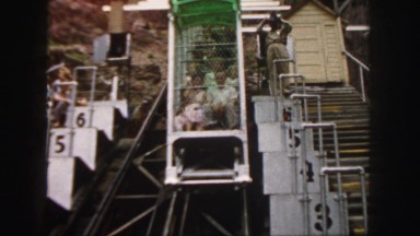 1958: a group of people in a gondola going up COLORADO