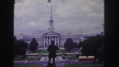 1958: an elevated statue faces across the center of a formal government