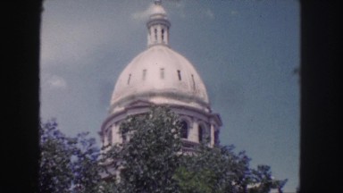 1958: Historic Watchtower Monument Surrounded by Wild Growth in Colorado