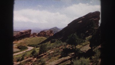 1958: rocky mountainous area with sparse vegetation under the cloudy sky