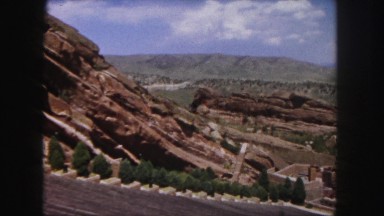 1958: a beautiful desert and rugged mountain ridgeline with a bright blue sky