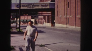 1958: man walking on an empty street COLORADO