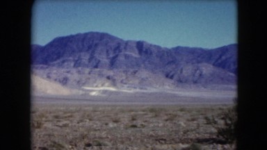 1957: a hilly area is seen with trees and greenery DEATH VALLEY, CALIFORNIA