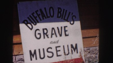 1958: the display board of a museum cum grave in black and white COLORADO