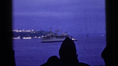 1958: a large ship on the water pulling into a harbor NEW YORK CITY