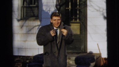 1958: a man having fun with his winter coat NEW YORK CITY