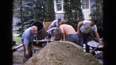 1960: Men Mixing Cement in an Old-Fashioned Cement Mixer Wauconda, Illinois