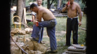 1960: group of men outside doing the yardwork WAUCONDA, ILLINOIS