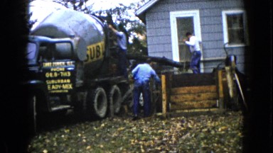 1960: a few men are working with a rotary chamber near to building WAUCONDA