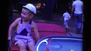 1959: A Topless Kid Pouring in a Pot at Catskill Game Farm, New York