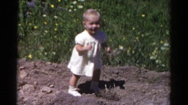 1959: Three Young Kids Playing in a Dirt Patch at Catskill Game Farm
