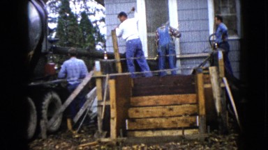 1960: Construction Site Beside Muddy Water in Wauconda, Illinois