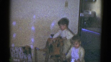 1959: young child playing on horse CATSKILL GAME FARM, NEW YORK