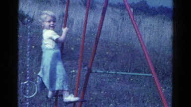 1959: a child playing with a swing in park CATSKILL GAME FARM, NEW YORK