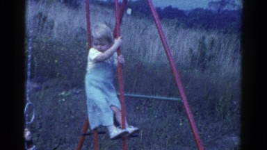 1959: kids playing on a swingset CATSKILL GAME FARM, NEW YORK