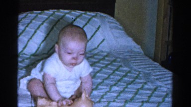 1959: cute infant sneezing CATSKILL GAME FARM, NEW YORK