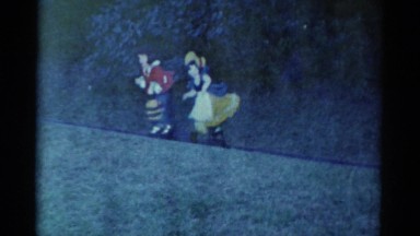 1959: an amusement park display featuring two characters