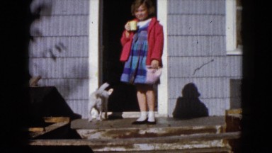 1960: A Girl Walking Inside a House in Wauconda, Illinois