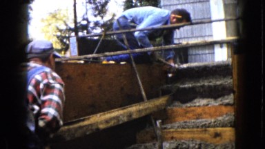 1960: Two Builders Constructing and Repairing Steps in Wauconda, Illinois