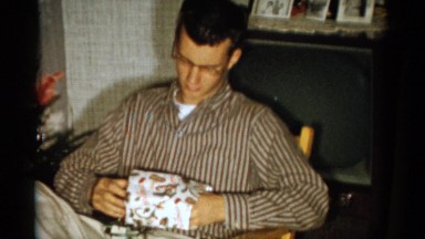 1959: a father with child is seen near a christmas tree CATSKILL GAME FARM