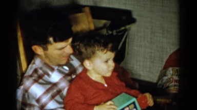 1959: parent and child spending quality time together, bonding over a toy