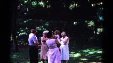1963: Small Group of People and a Baby Gathered on Grass in Cold Springs, New York