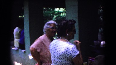 1963: two older women standing outside at a family picnic COLD SPRINGS, NEW YORK