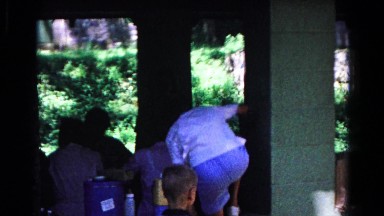 1963: kids climbing walls at summer family reunion party COLD SPRINGS, NEW YORK