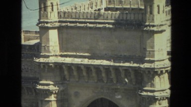 1974: a beautiful historic building set against a scenic river INDIA