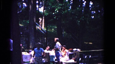 1963: enjoying a meal on a holiday with the family in the countryside