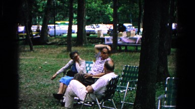 1963: adults chilling and chatting in the park COLD SPRINGS, NEW YORK