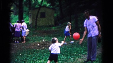 1963: a father is seen playing with children COLD SPRINGS, NEW YORK