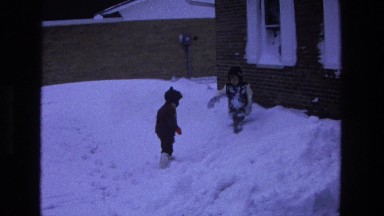 1975: Kids Walking in Deep Snow Winter Home California