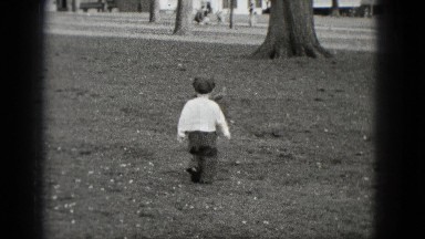 1948: little boy chases pigeons in the park MIDDLETOWN PENNSYLVANIA