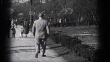 1948: people are seen in a tourist area and are observing a building MIDDLETOWN