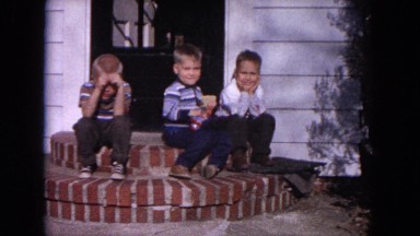1964: siblings are seen playing outdoor and posing EVANSTON, ILLINOIS