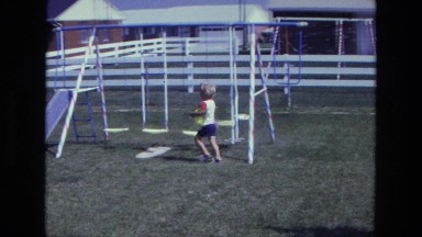 1975: A Park Scene with Beautiful Flowers and Grass Area California
