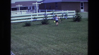 1975: A Child Running Through the Yard After a Yellow Balloon California