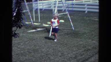 1975: a child near a swing is seen CALIFORNIA