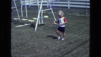 1975: a kid is seen near a swing CALIFORNIA