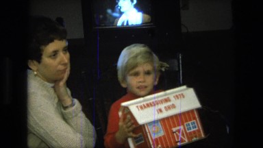1975: children are seen indoors playing CALIFORNIA
