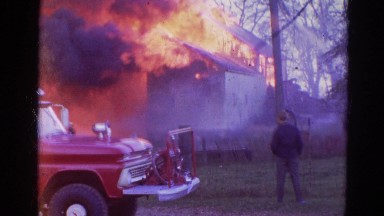 1968: a house is seen destroyed with fire WAUCONDA, ILLINOIS
