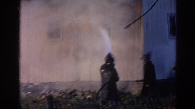 1968: firefighters battling flames that have spread to a second house. WAUCONDA
