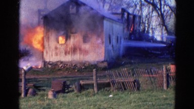 1968: a house is seen destroyed with fire WAUCONDA, ILLINOIS