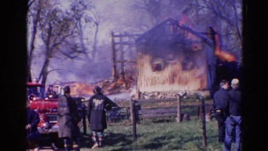1968: a house is seen destroyed with fire WAUCONDA, ILLINOIS