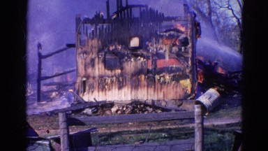 1968: a house is seen destroyed with fire WAUCONDA, ILLINOIS