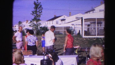 1962: people outside having a large family picnic with the kids HAGERSTOWN