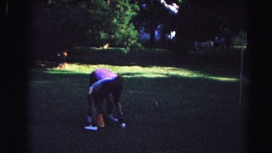 1962: children ignite a firecracker under a bucket and play on a swing set