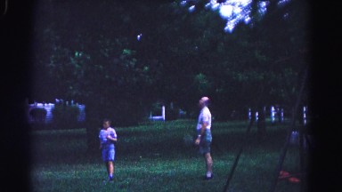 1962: a father is seen playing with children HAGERSTOWN, MARYLAND